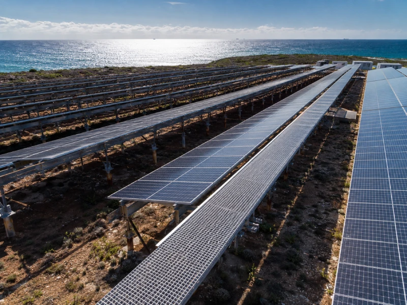 FRP solar grating walkway installed on coastal utility-scale PV system resisting salt corrosion and supporting maintenance access